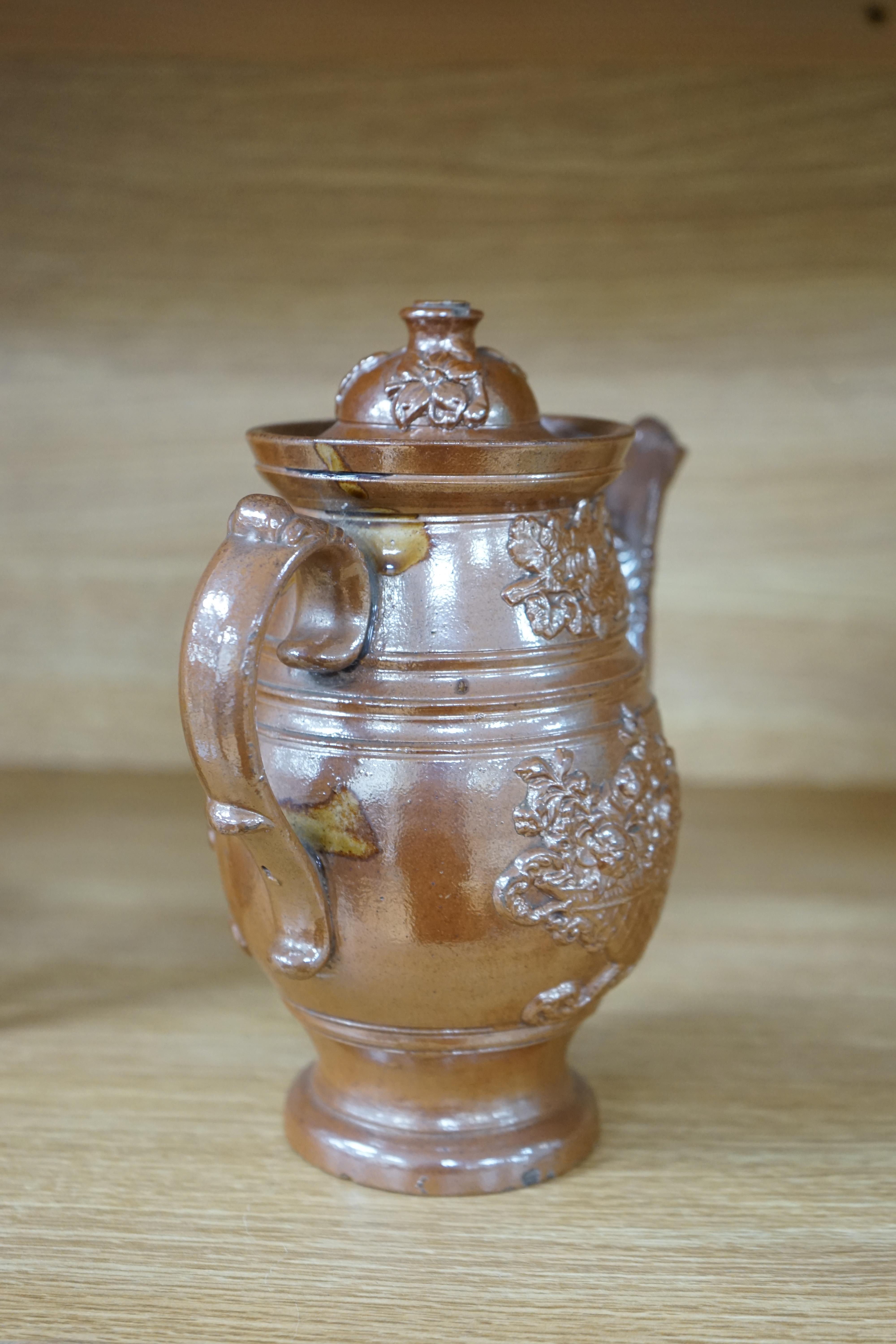 A Derbyshire salt-glaze coffee pot, 21cm high. Condition - fair, two significant chips to lid and other minor chipping.